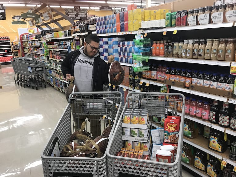 The Aptus team gathering groceries for a charity